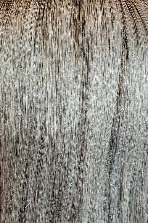 Éclipse: A mesmerizing fusion of dark roots that gradually fade into a soft blend of gray and silver, like the shadowed beauty of an eclipse. This stunning color creates a captivating contrast, offering depth and radiance.